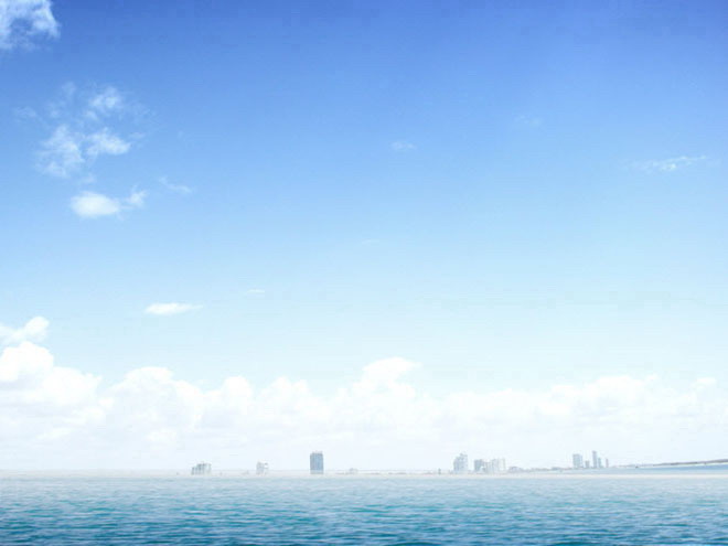 淡雅蓝色海洋海平面PowerPoint背景图片下载